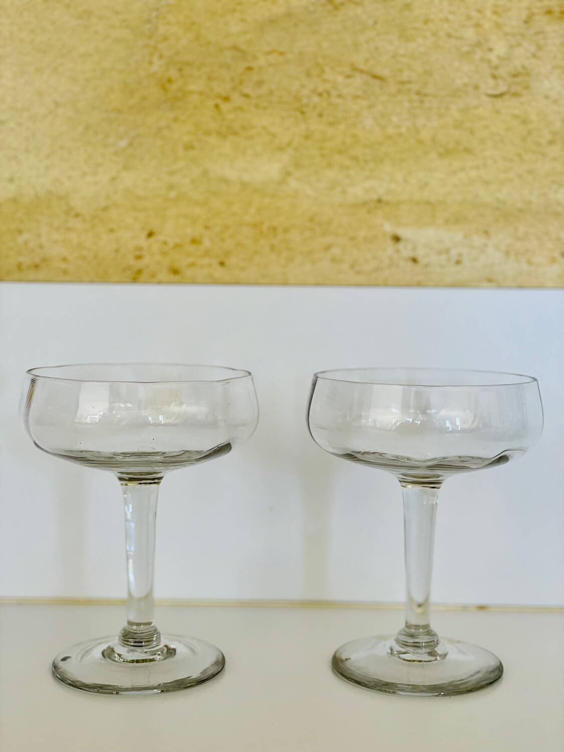 2 champagne coupes, cocktail coupes
