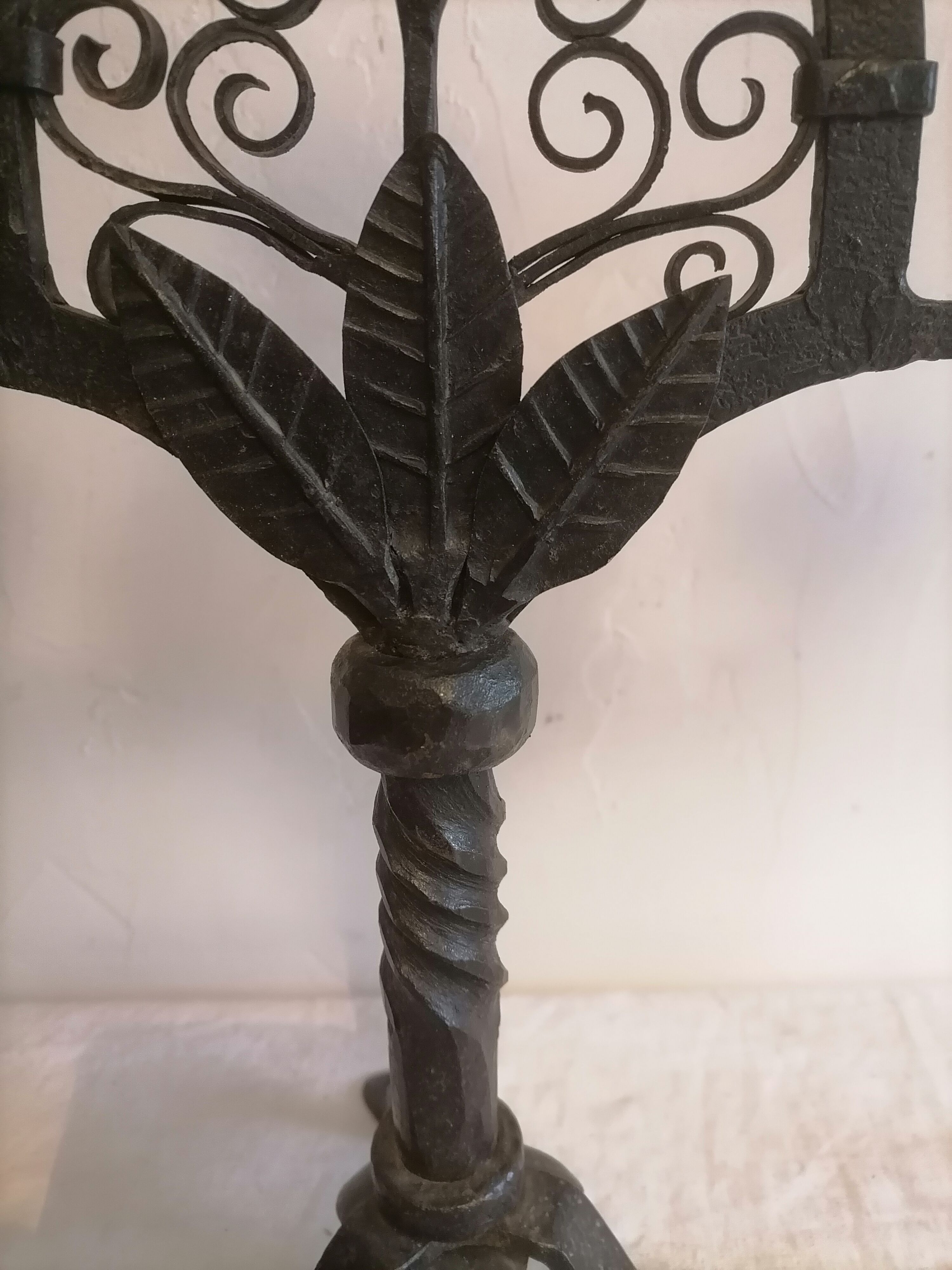 Pair of wrought iron candelabras. Mid-twentieth century.