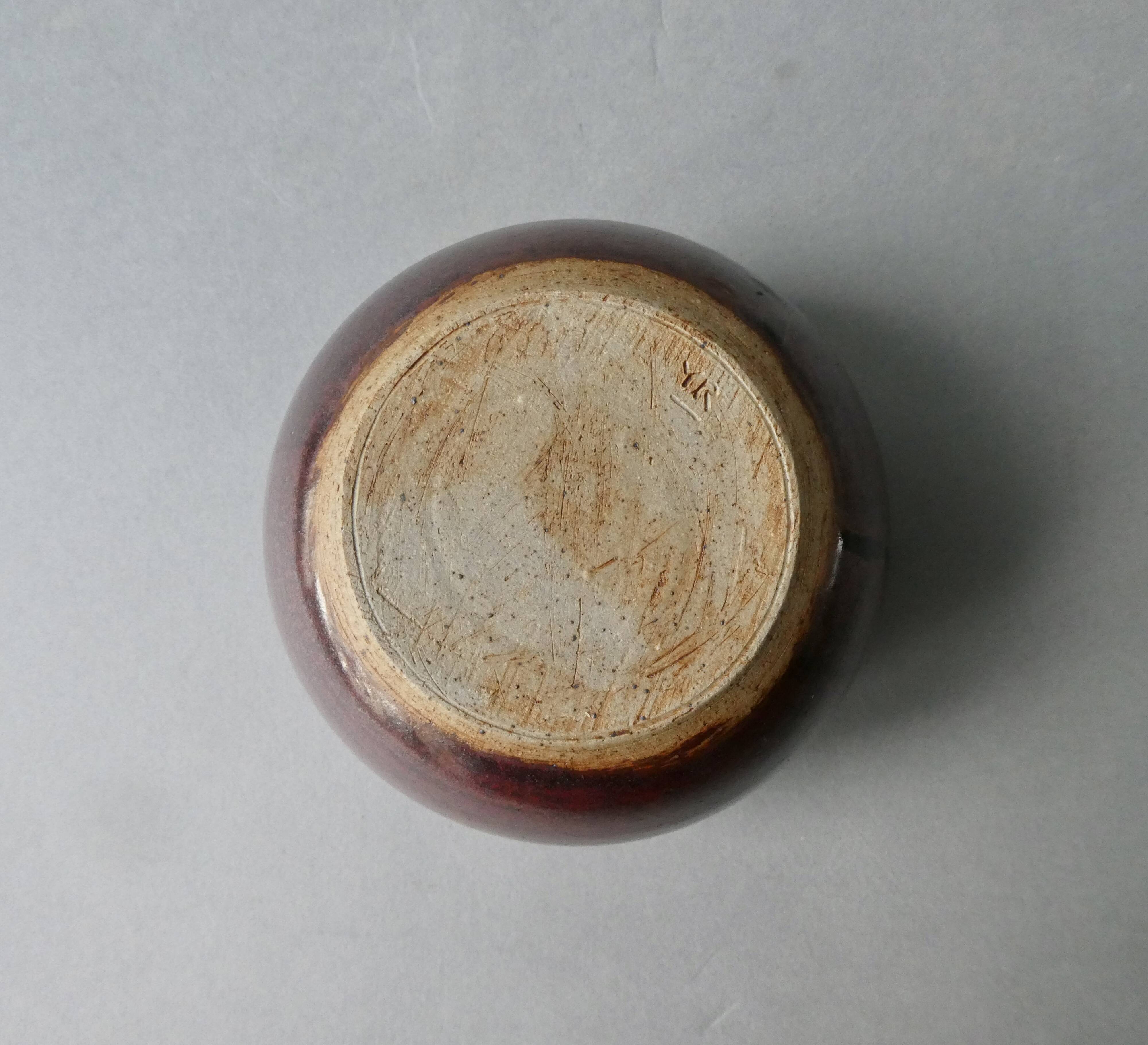 Sandstone ball vase signed Yves Remond