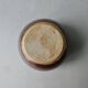 Sandstone ball vase signed Yves Remond
