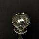 Glass oil lamp blows on foot shower