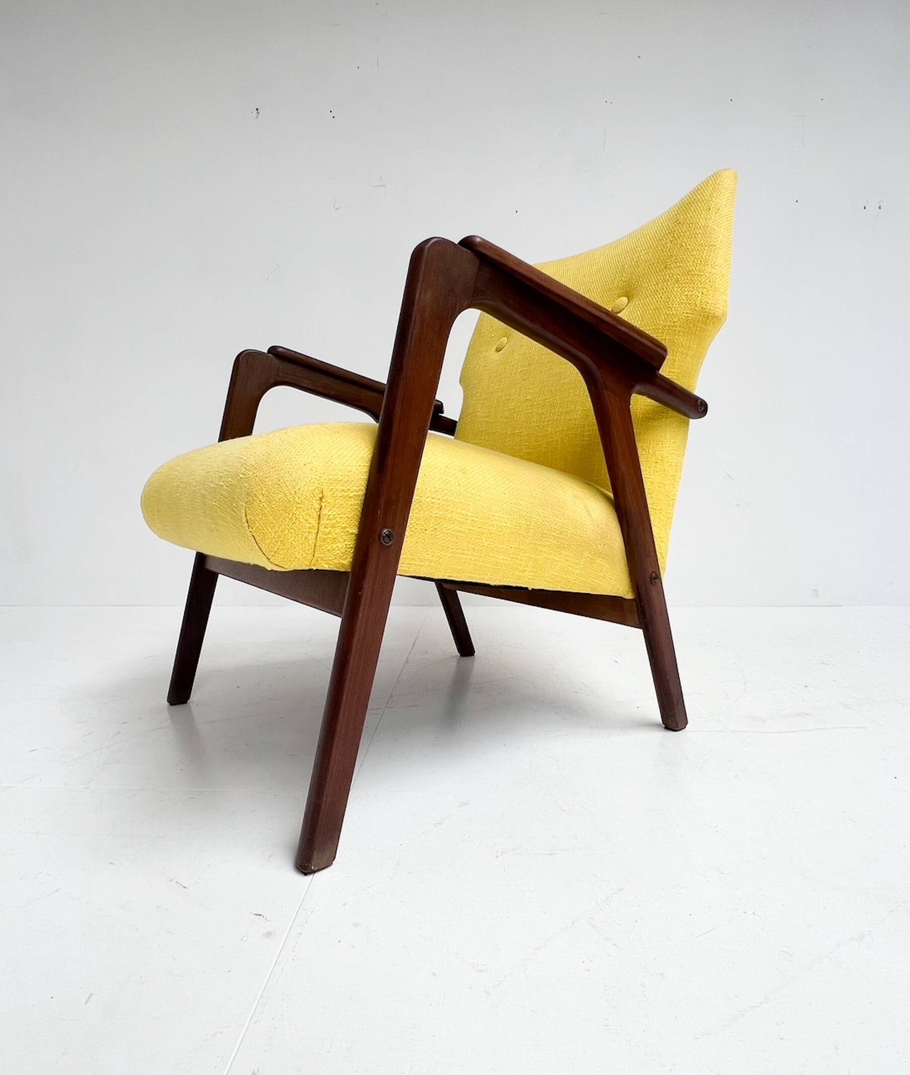 Wooden wingback chair from the 1960’s