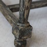 Patinated wooden stool with straw seat