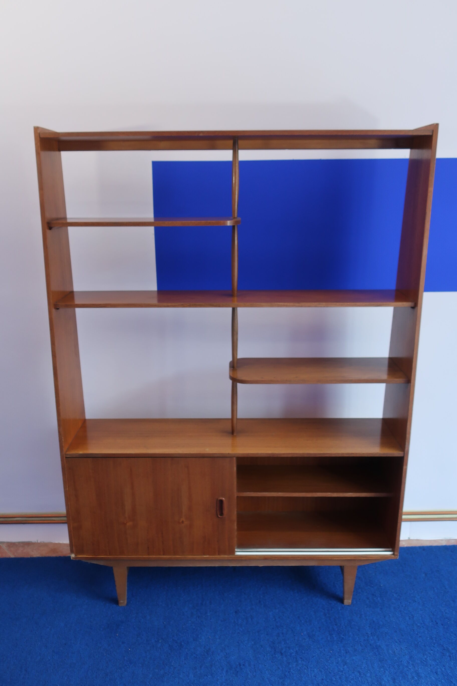 Library separator of 60s teak pieces