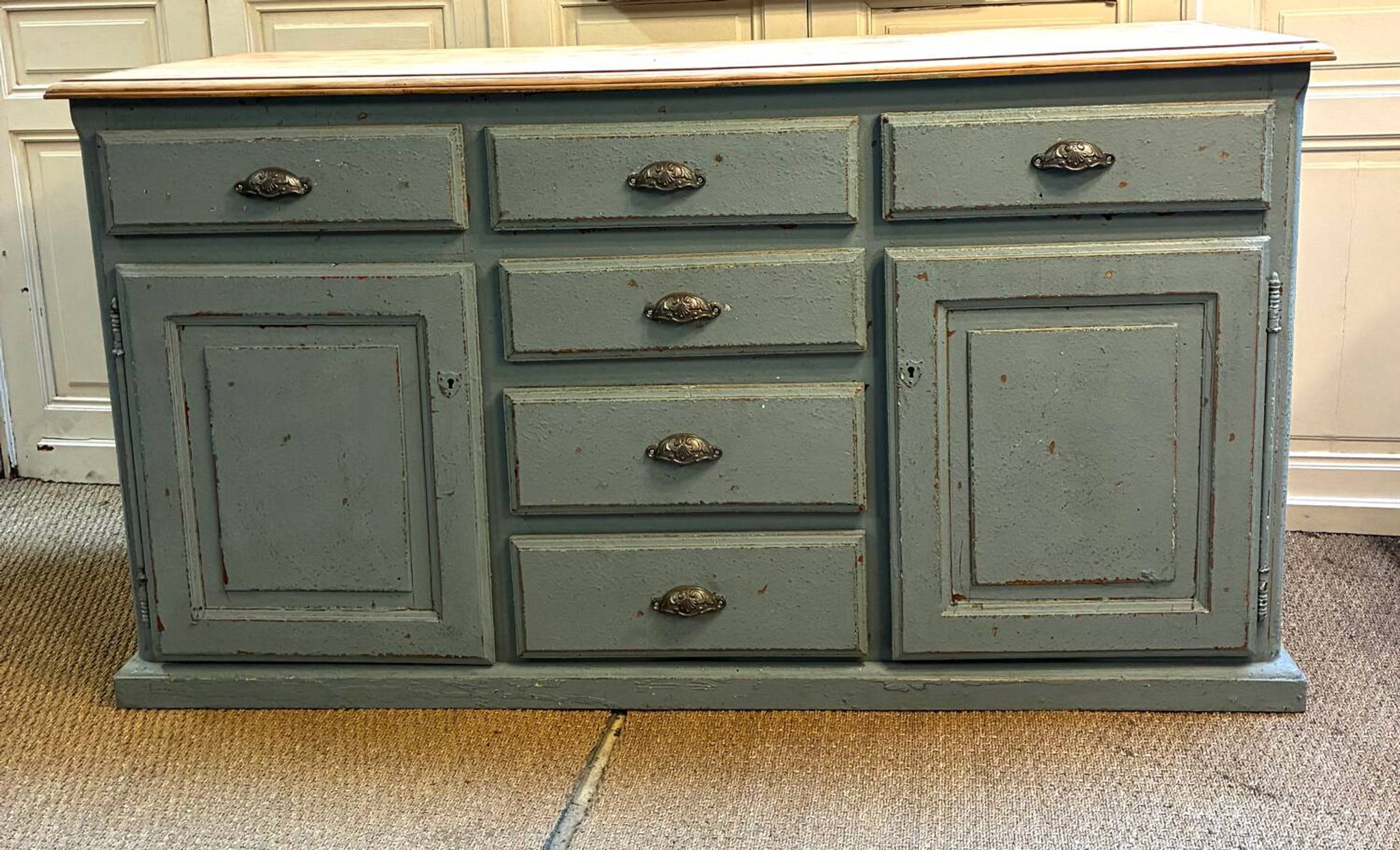 Old piece of furniture with six drawers and two doors