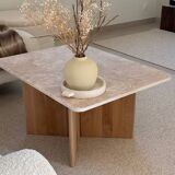 Rectangular coffee table in travertine and raw oak.