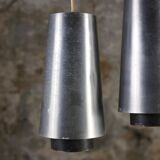 Trio of Raak steel pendant lights, 1960s