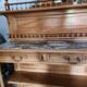 Antique cherry wood sideboard with marble top, 2 front drawers, 1 shelf.
