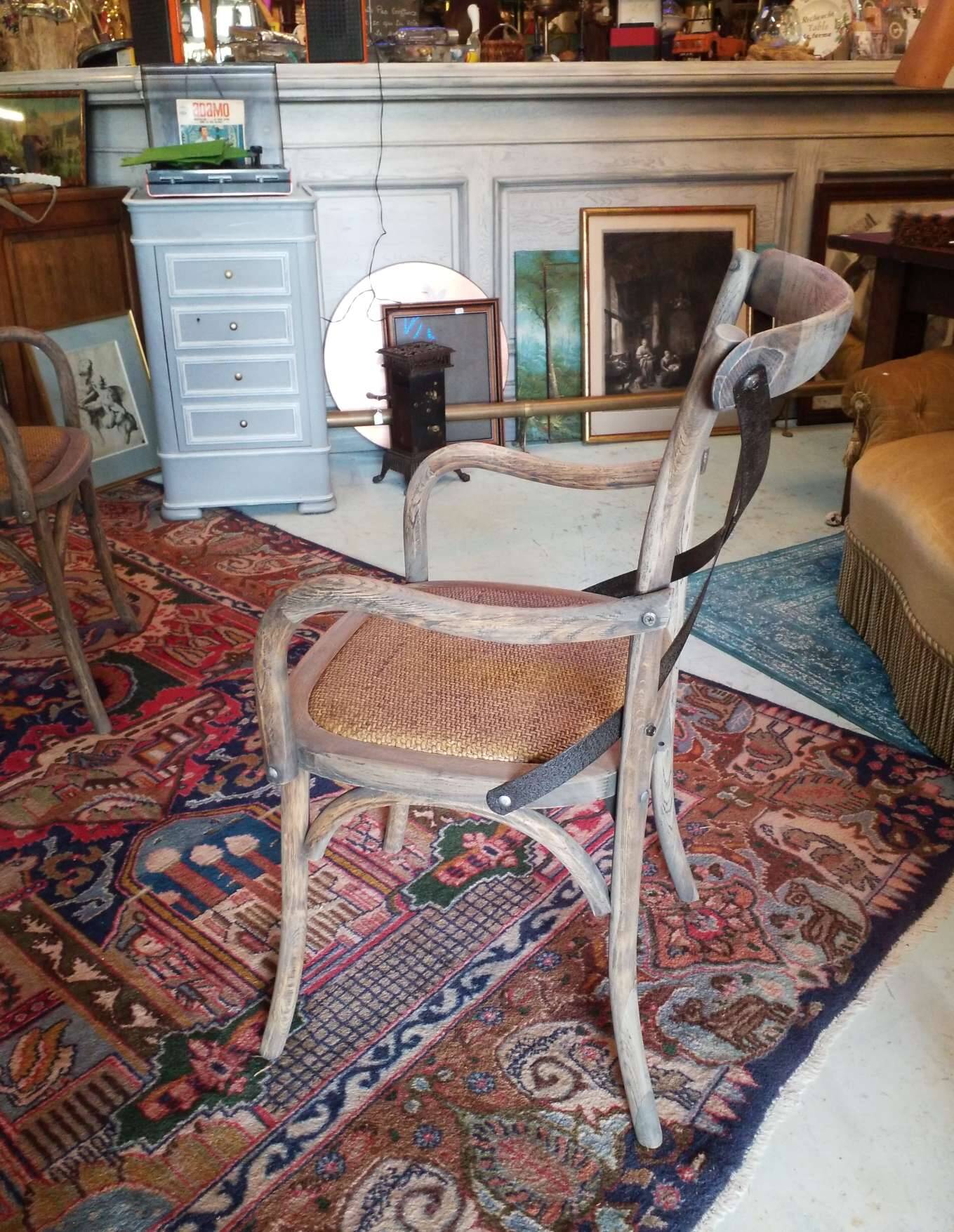 Angled wooden armchairs