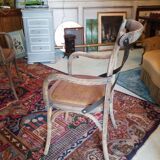 Angled wooden armchairs