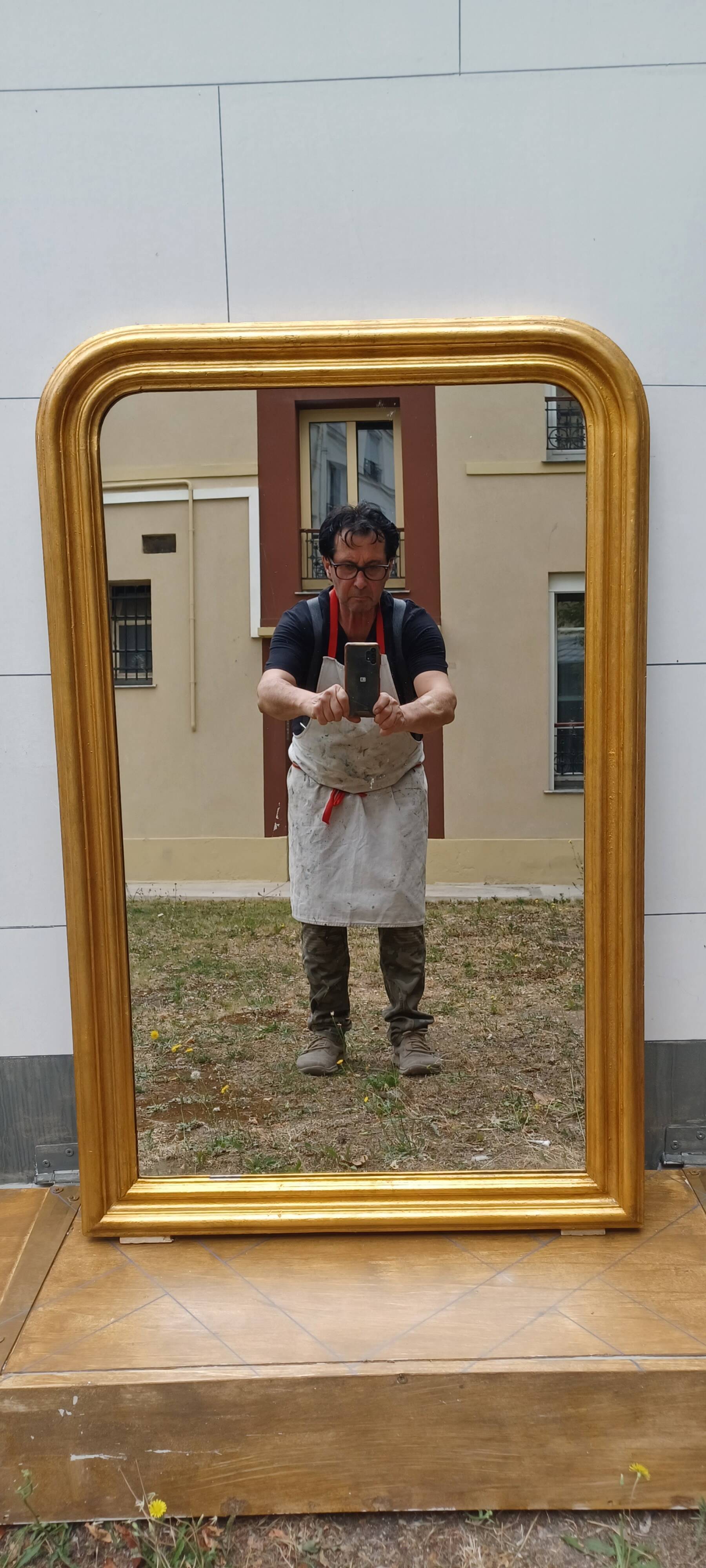 Antique louis-philippe gilt wood mirror from the 19th century. 102 cm x 65 cm