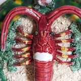 Plate in old barbotine with lobster