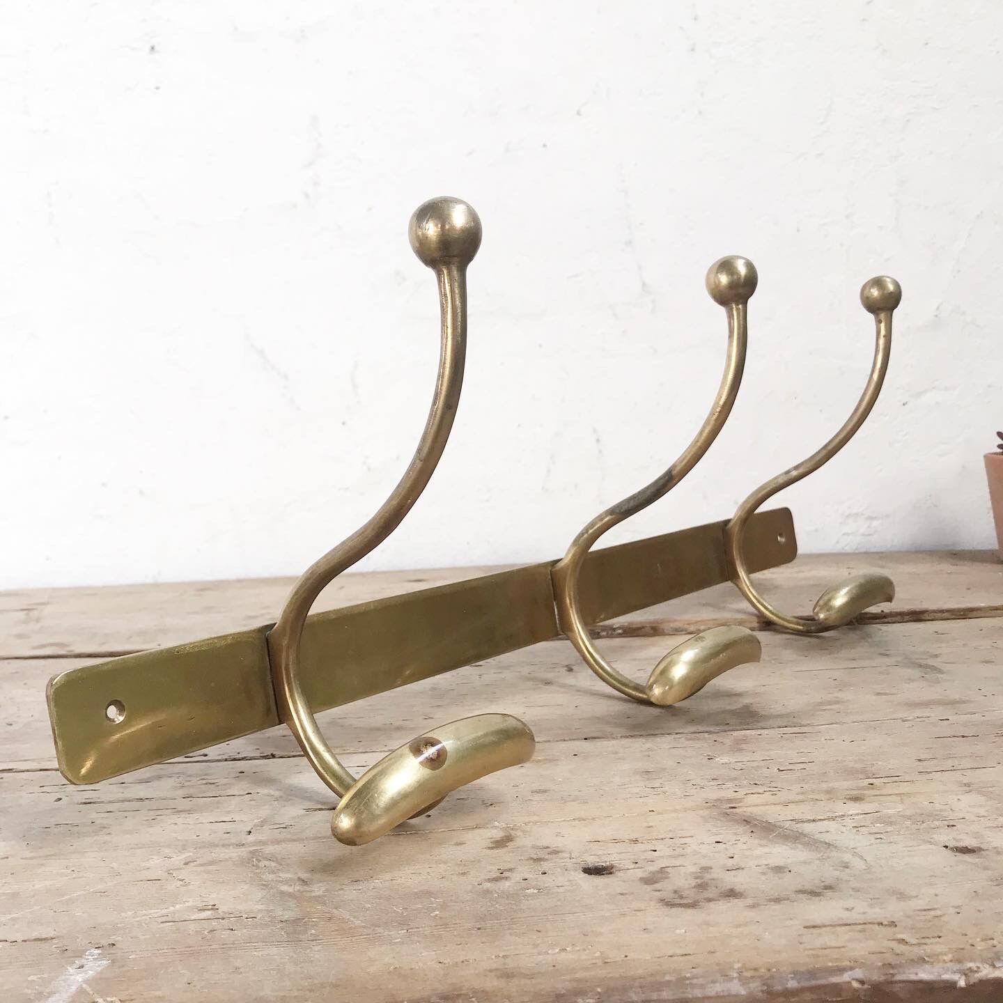 Brass wall coat rack