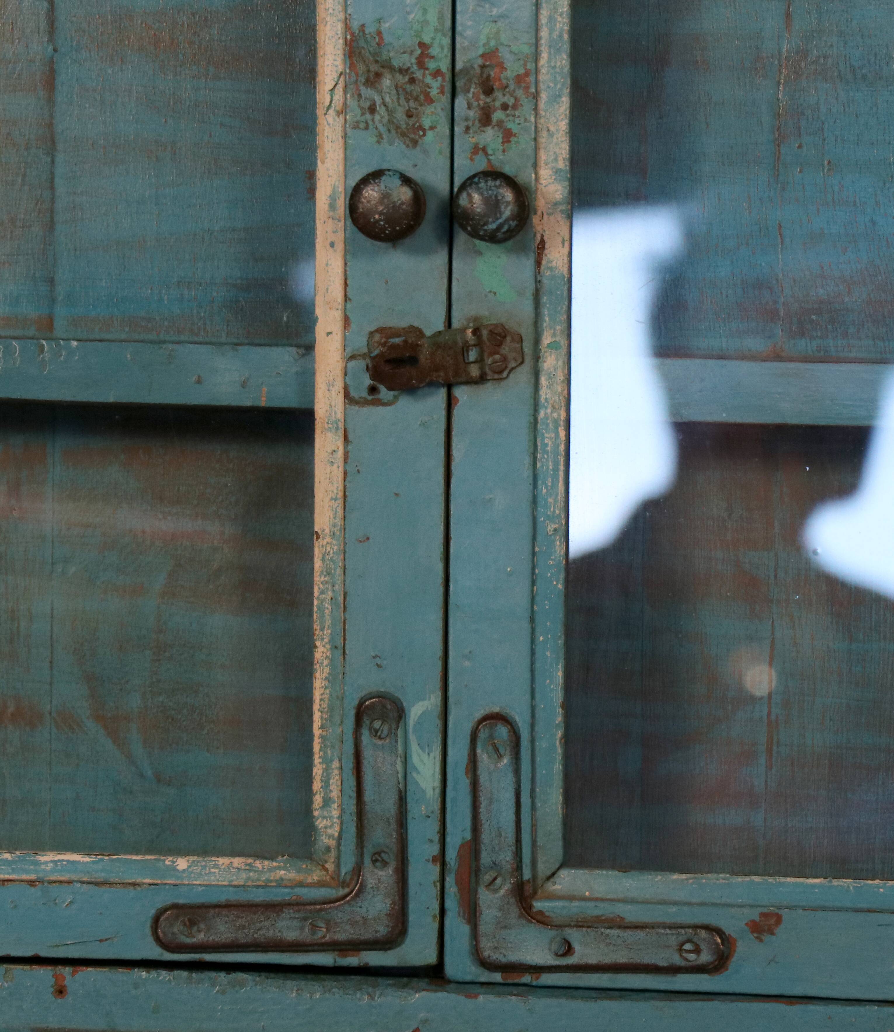 Old showcase in original blue patina Burmese teak