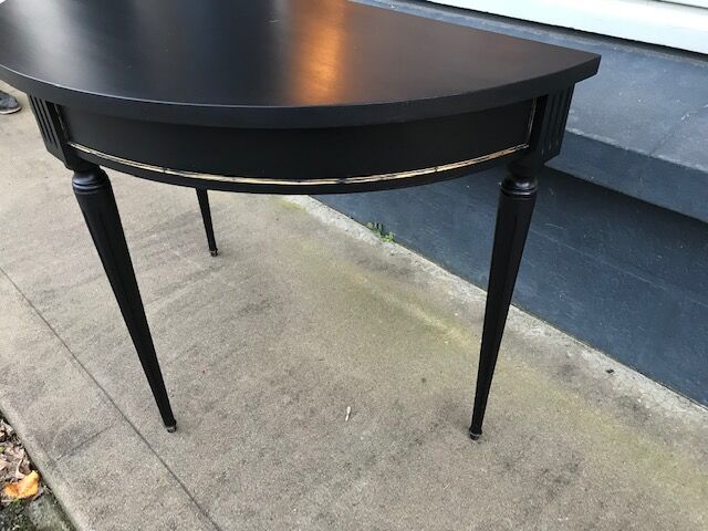Black half moon console