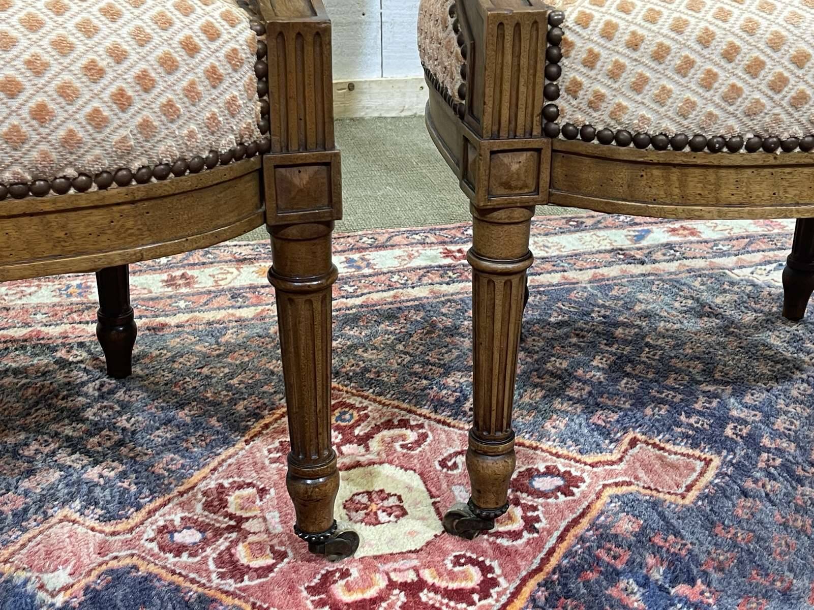 Pair of early 20th century Louis XVI armchairs in walnut