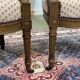 Paire de fauteuils Louis XVI début XXème en noyer