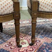 Paire de fauteuils Louis XVI début XXème en noyer