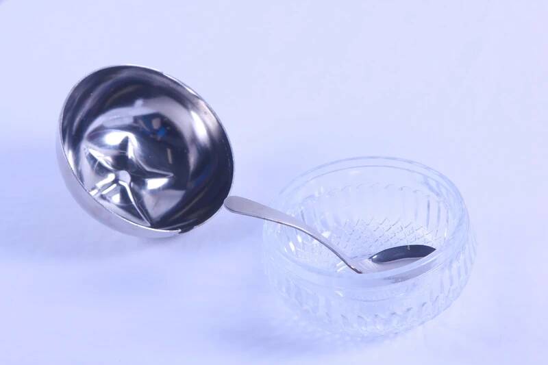 Antique sugar bowl/jam pot in the shape of an apple.