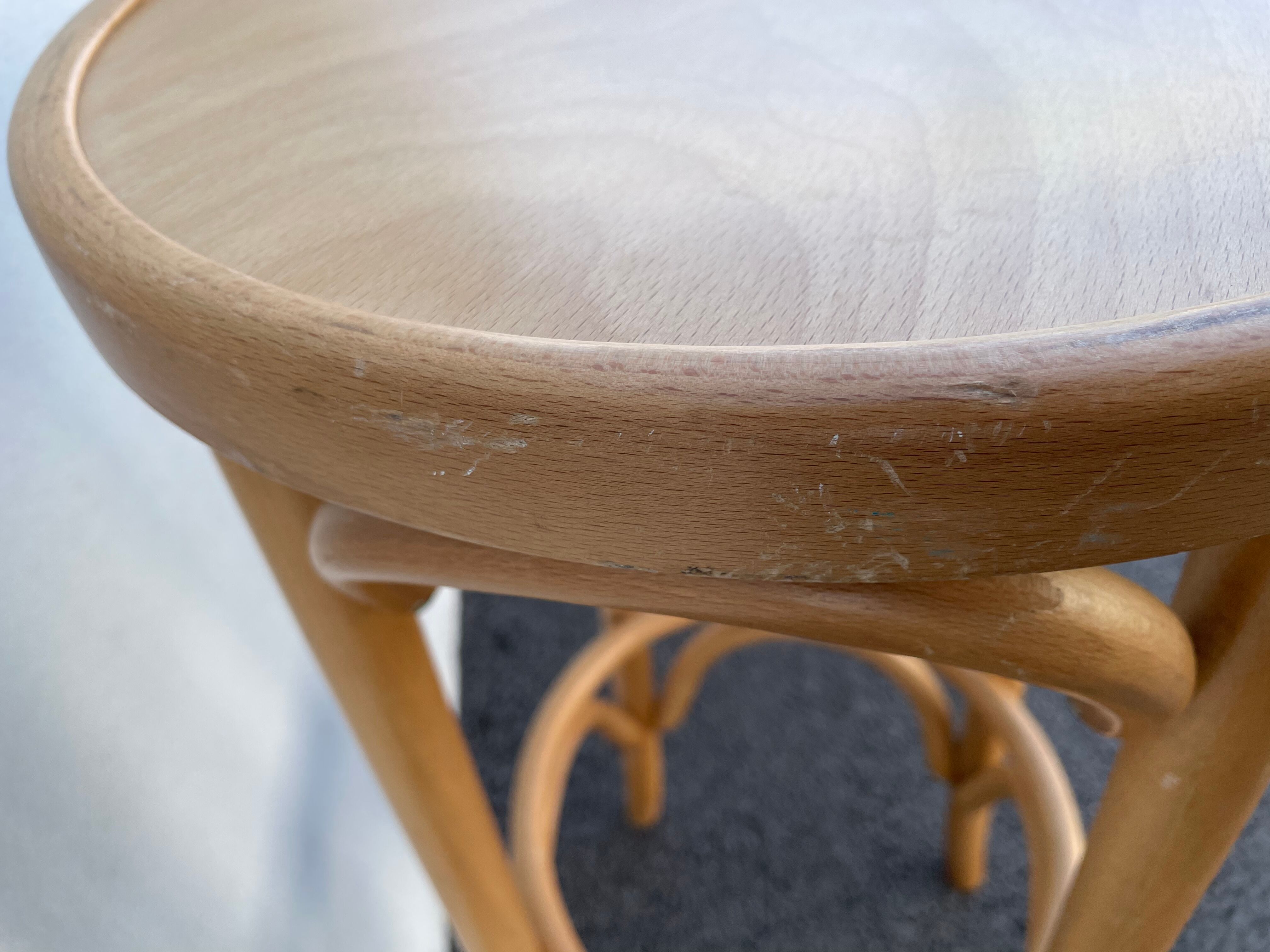 Curved wooden bar stool