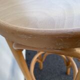 Curved wooden bar stool