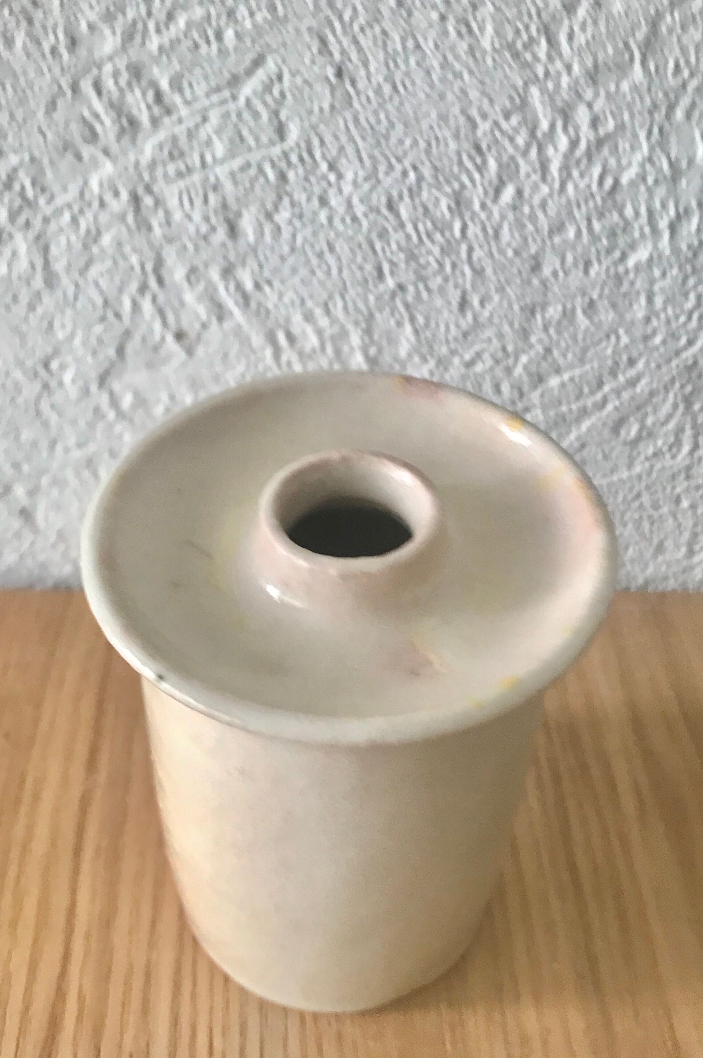White enamelled sandstone candlestick