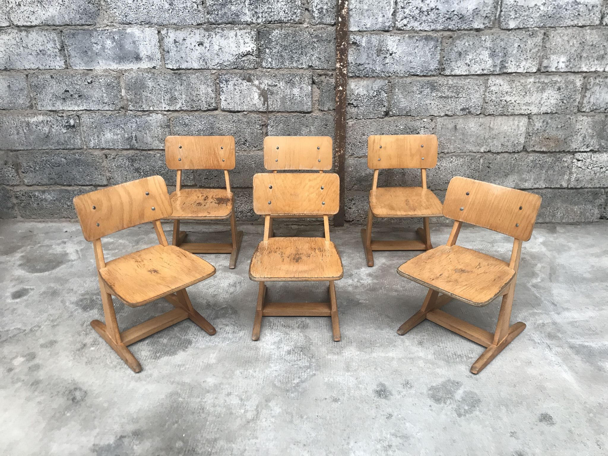 Series of 10 casala children's chairs in vintage light wood