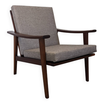 Scandinavian modernist armchair in teak, Denmark circa 1960.
