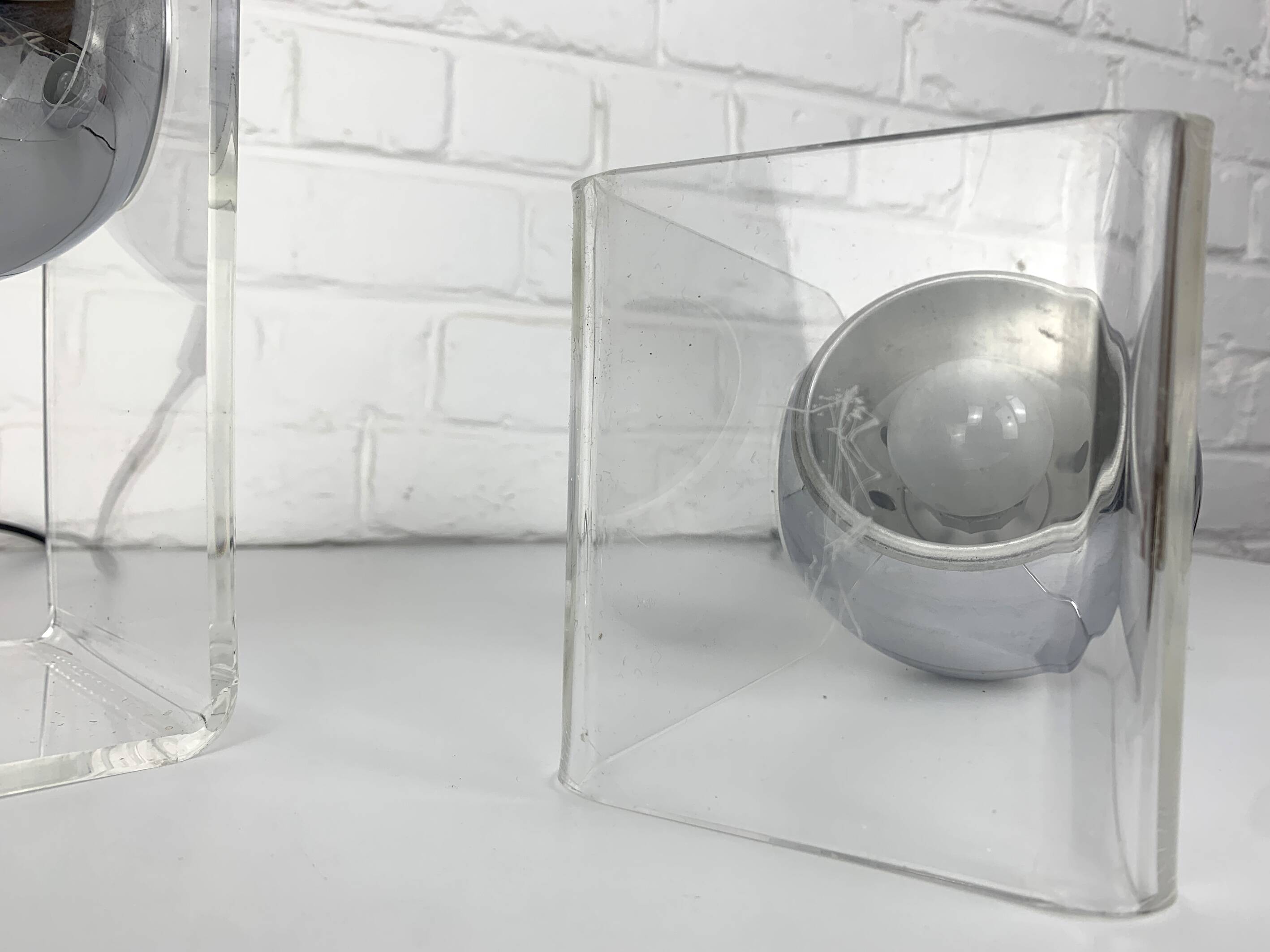Pair of space age chrome plexiglass sphere table lamps from the 70s