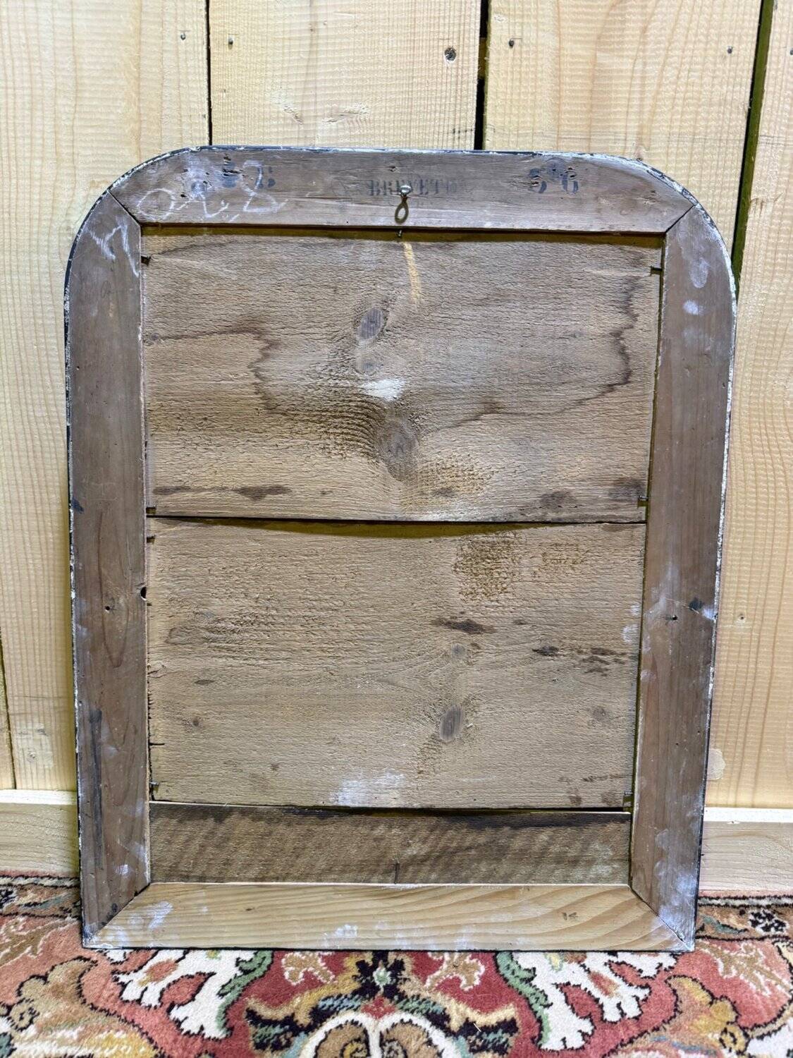 Miroir octogonal biseauté – Époque 1900 – Cadre bois teinté acajou