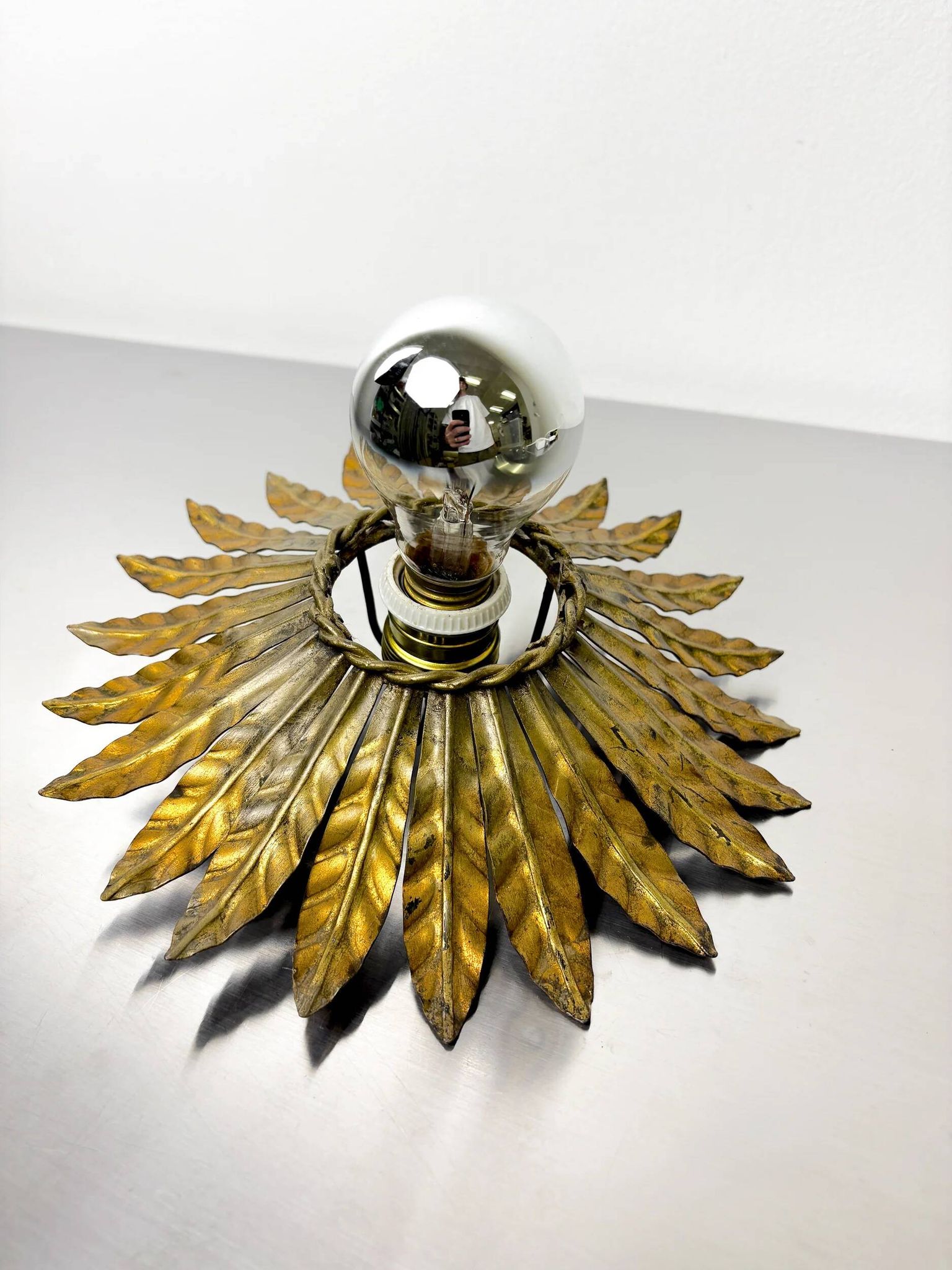 Spanish sunburst flush mount light fixture in gilt iron, circa 1960s