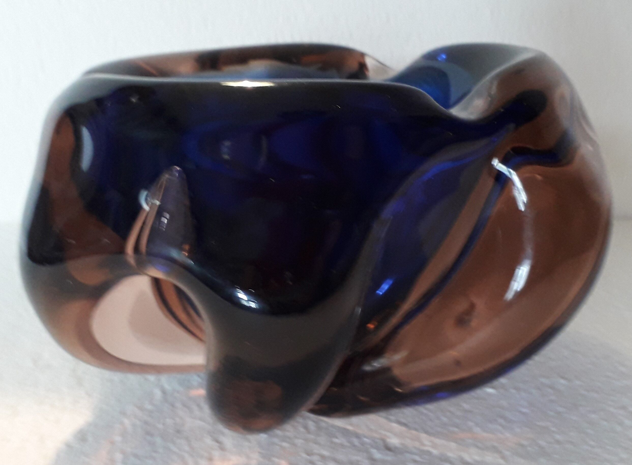 Empty ashtray blown glass pocket