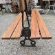 Antique double garden bench from the city of Paris in cast iron and wood