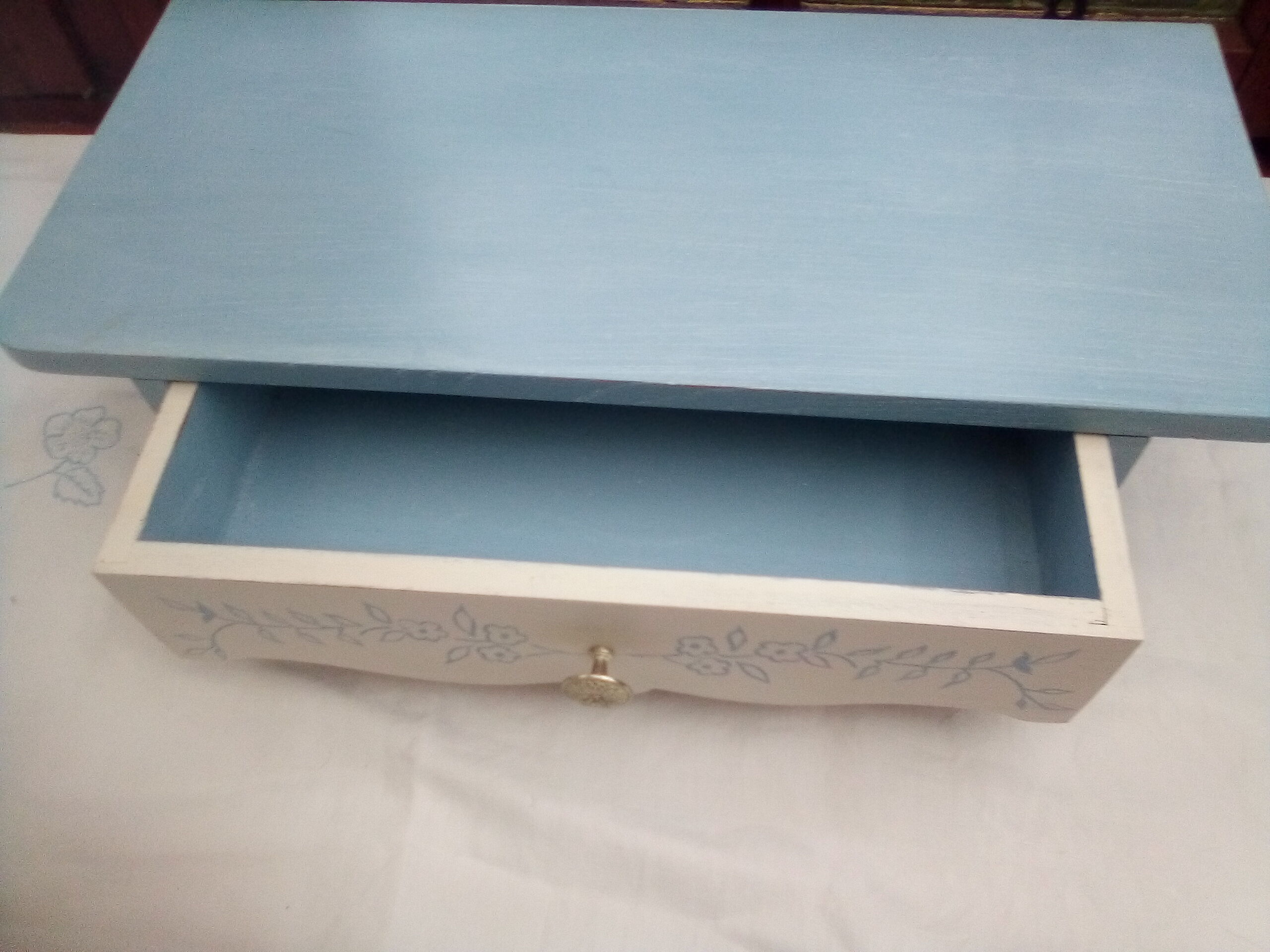 Old wooden shelf with drawer