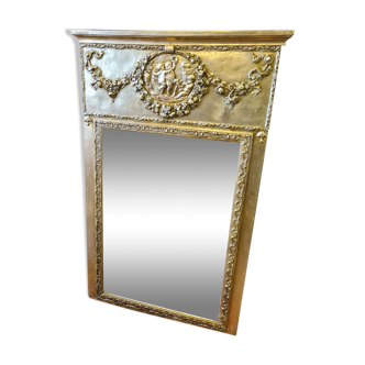 Golden patinated trumeau mirror