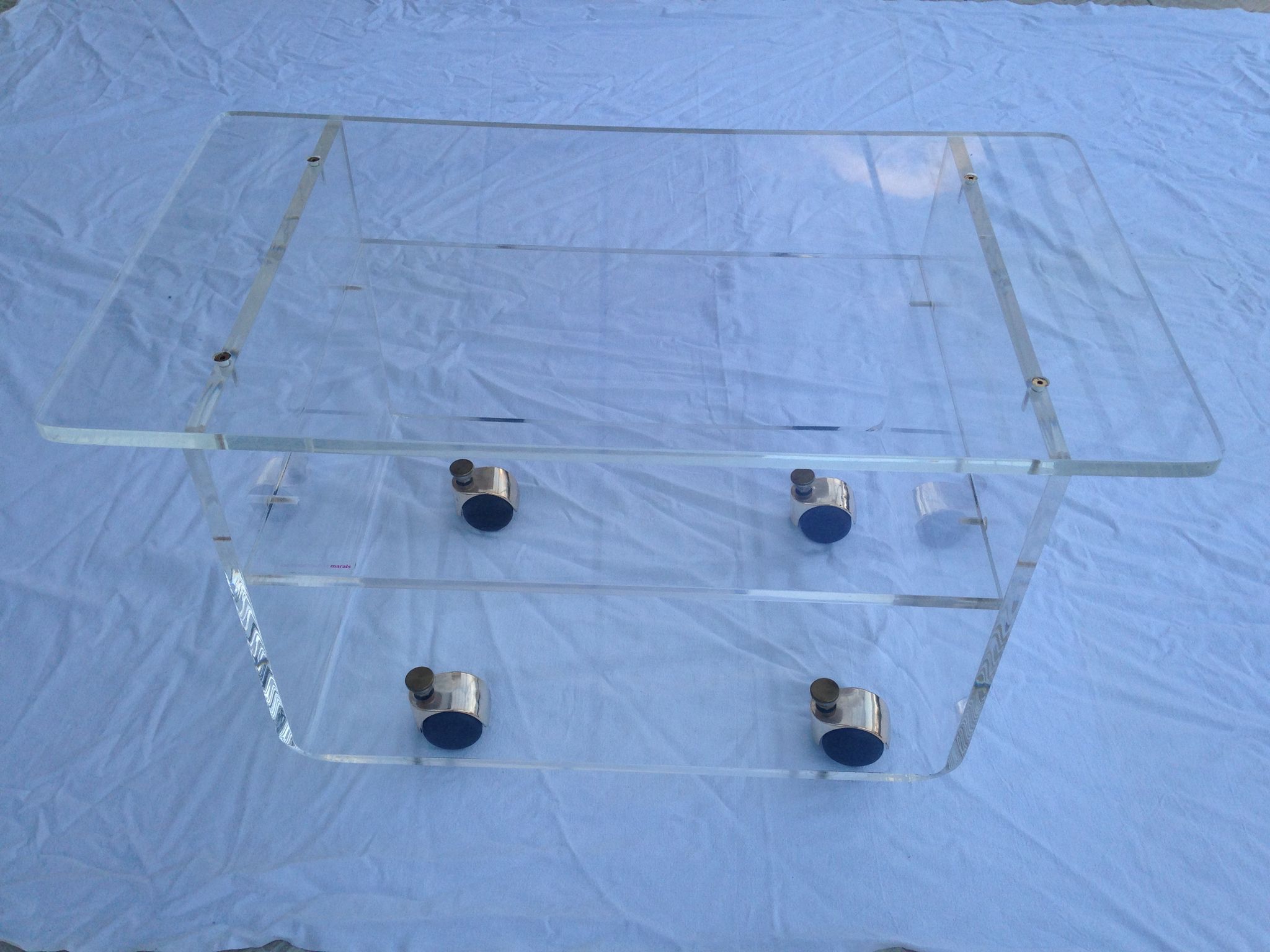 Plexiglas coffee table from Marais International