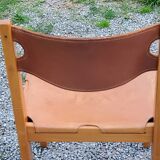 Pair of brutalist chairs in elm and stretched leather with saddle stitching Self publisher