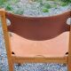 Pair of brutalist chairs in elm and stretched leather with saddle stitching Self publisher