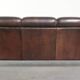 Unique sheepskin 3-seater sofa with deep colours and a distinctive design