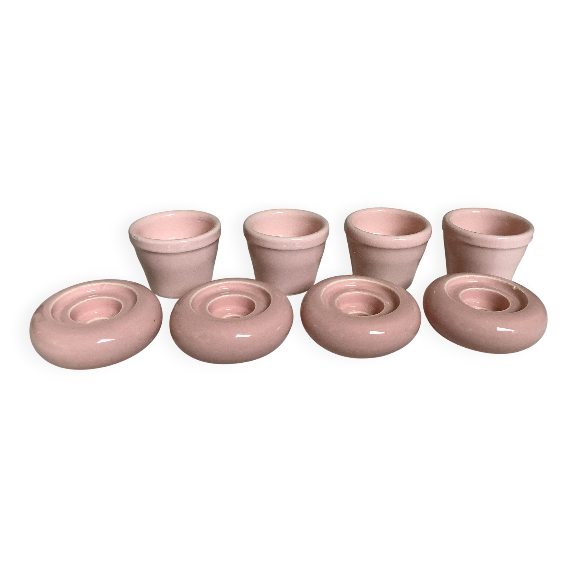 Four double pink candlesticks