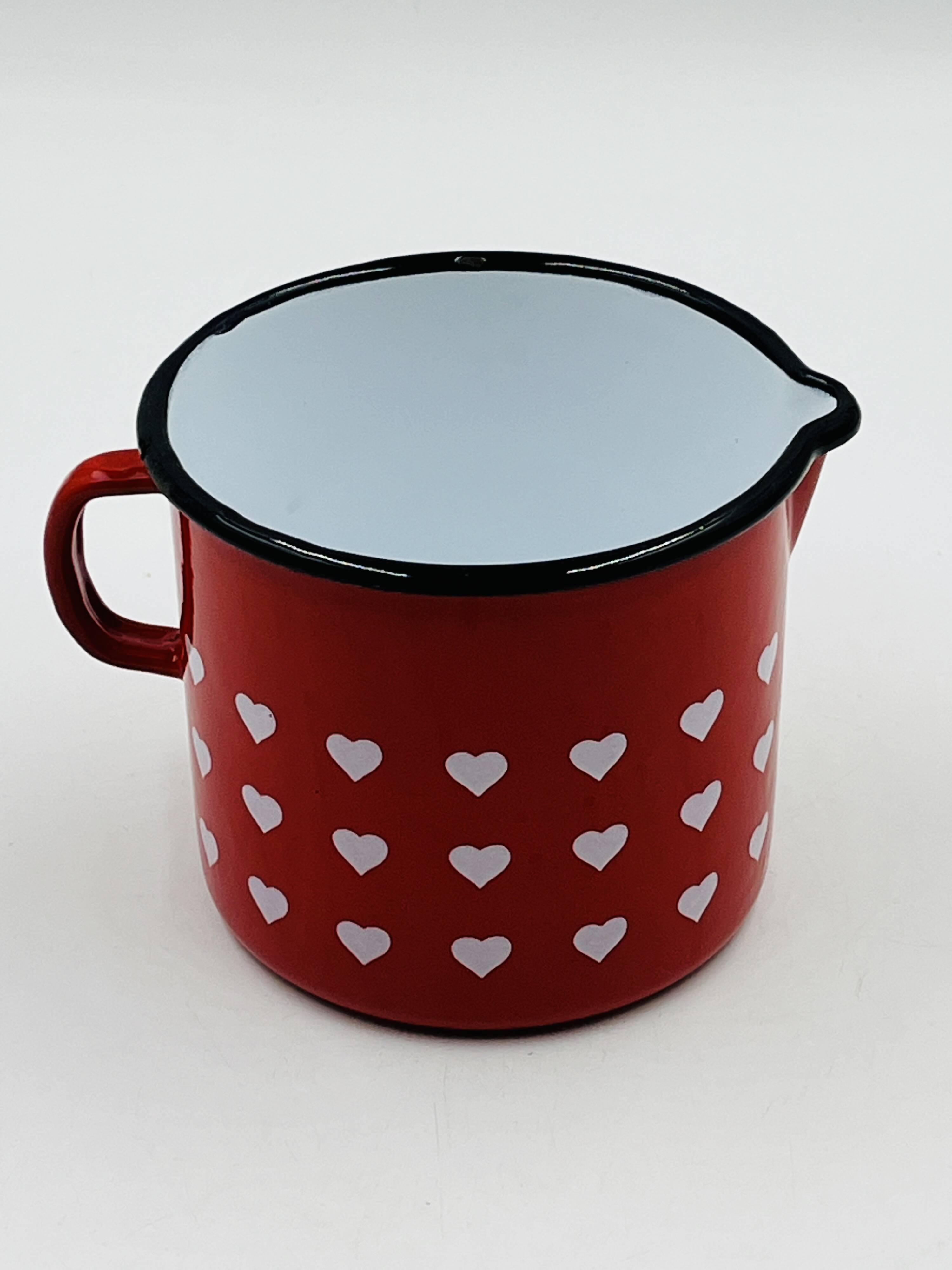 Vintage red enamelled measuring jug with hearts