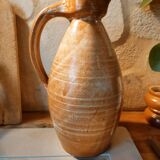 Duo of pitchers water, wine