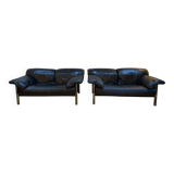 Pair of black leather sofas produced by Poltrona Frau, circa 1980/1990.