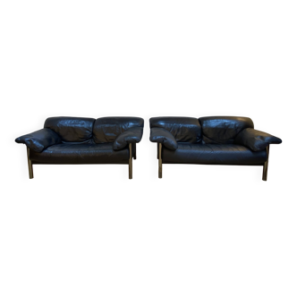 Pair of black leather sofas produced by Poltrona Frau, circa 1980/1990.