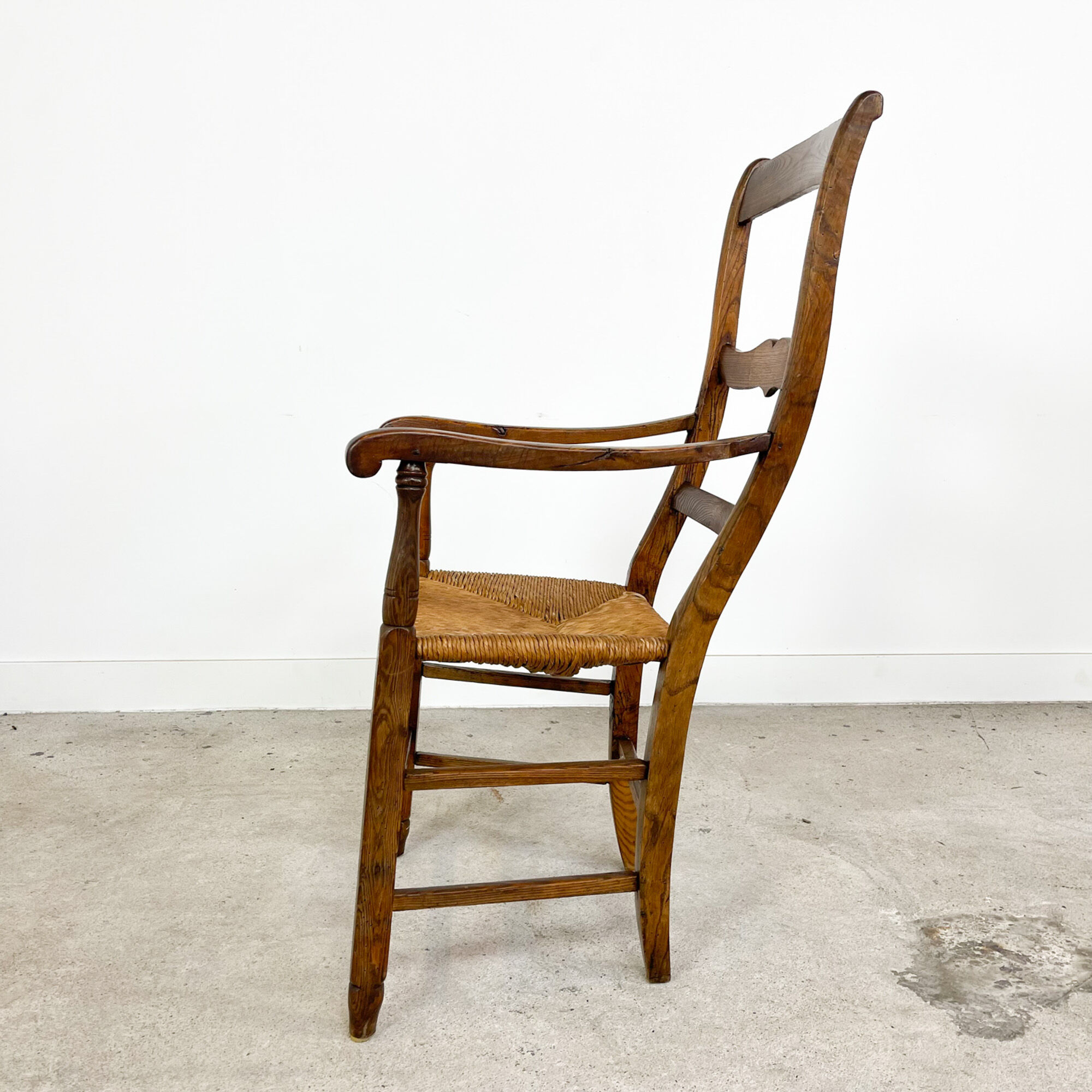 Antique oak armchair with cane seat 19th century