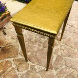 Coffee table in gilded wood