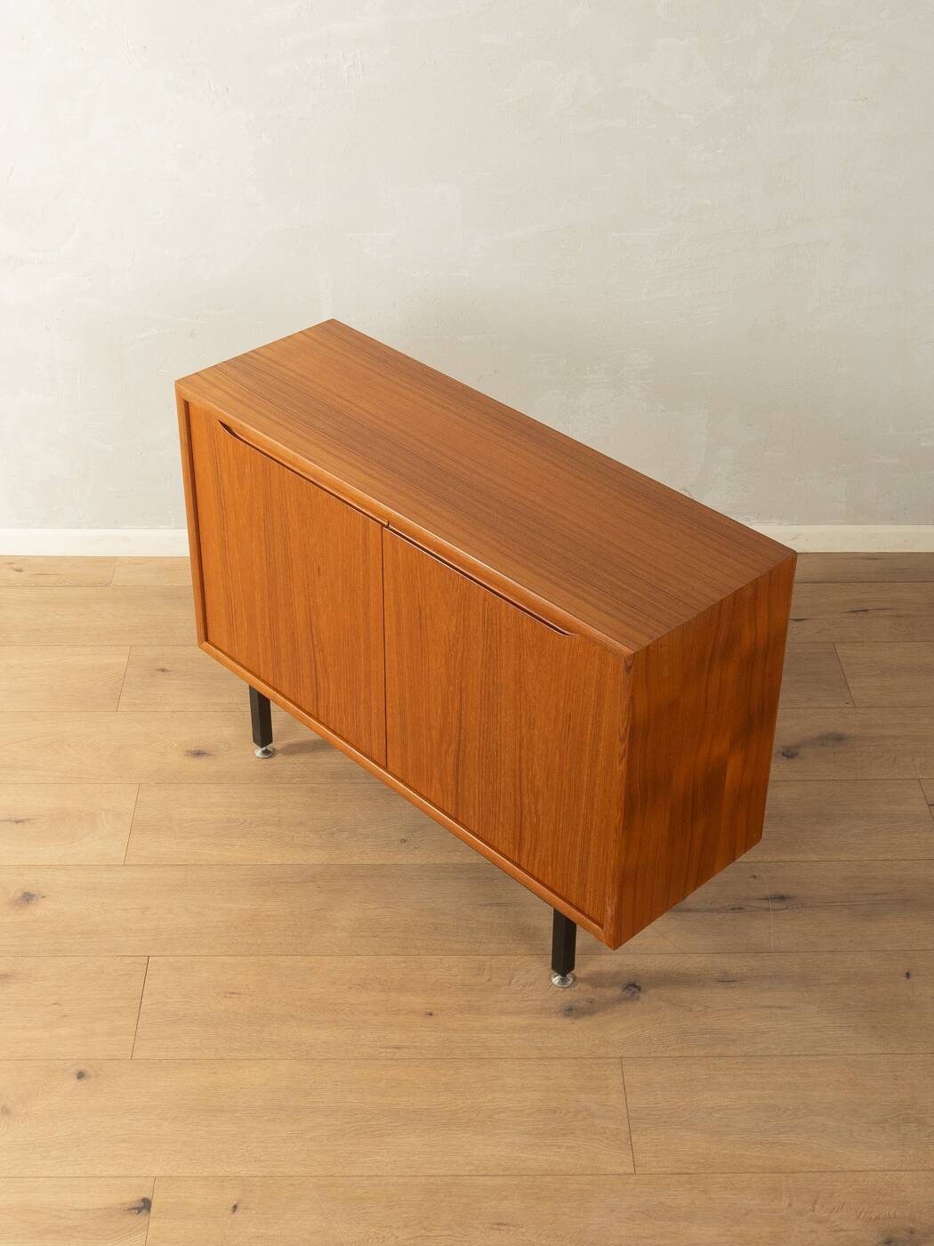 Classic chest of drawers from the 1960s with practical, closed storage space