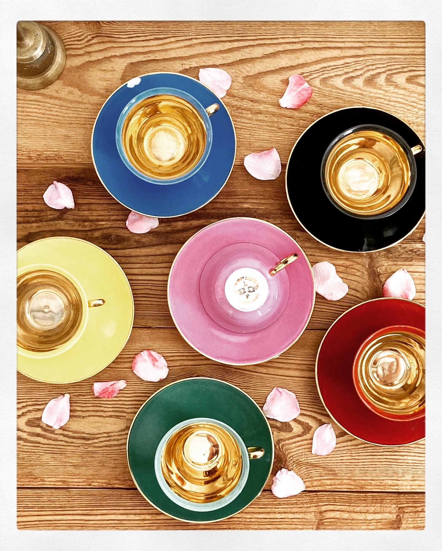 Set of colorful porcelain cups and cups