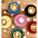 Set of colorful porcelain cups and cups