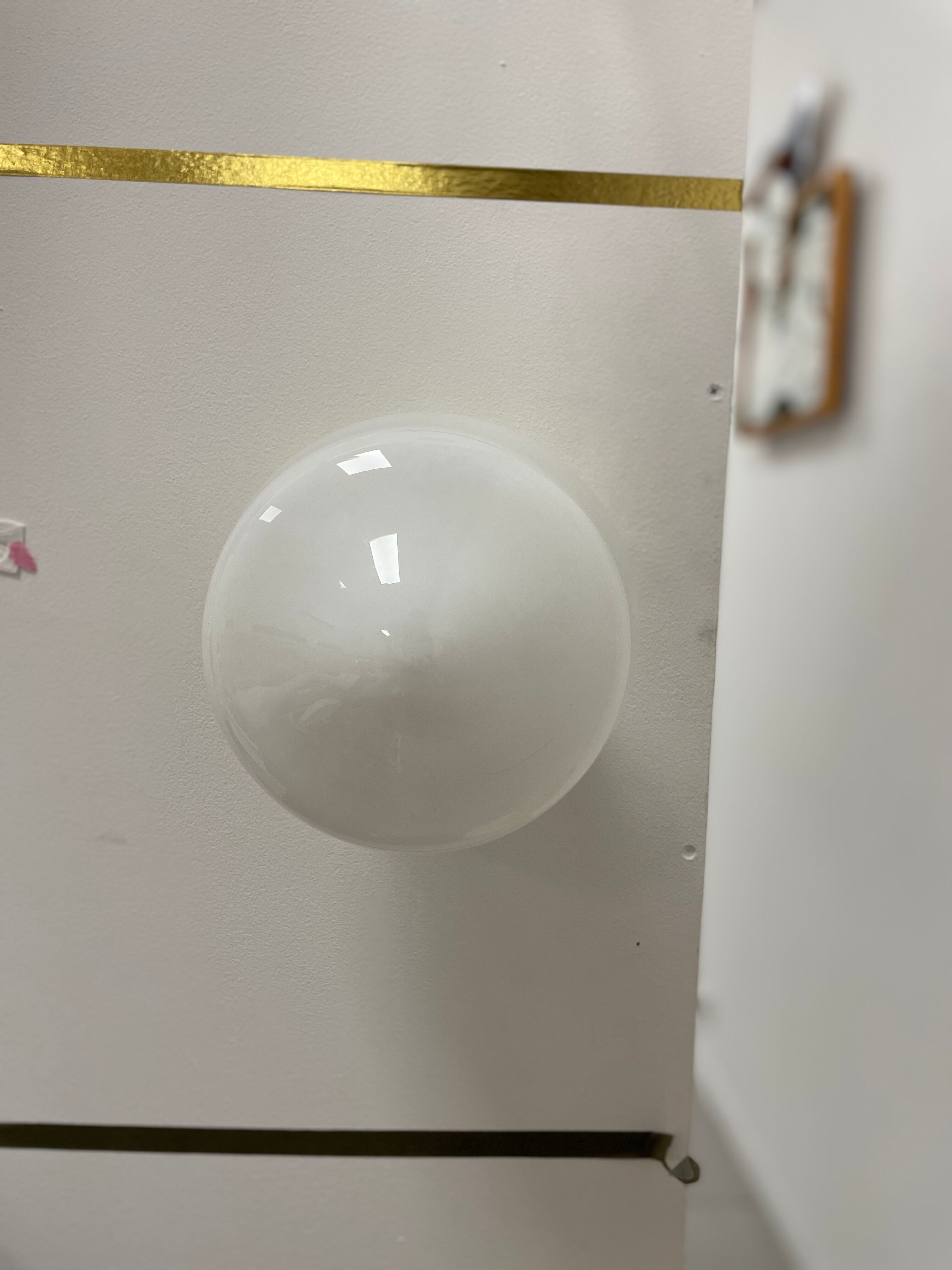 Opline and brass wall lamp